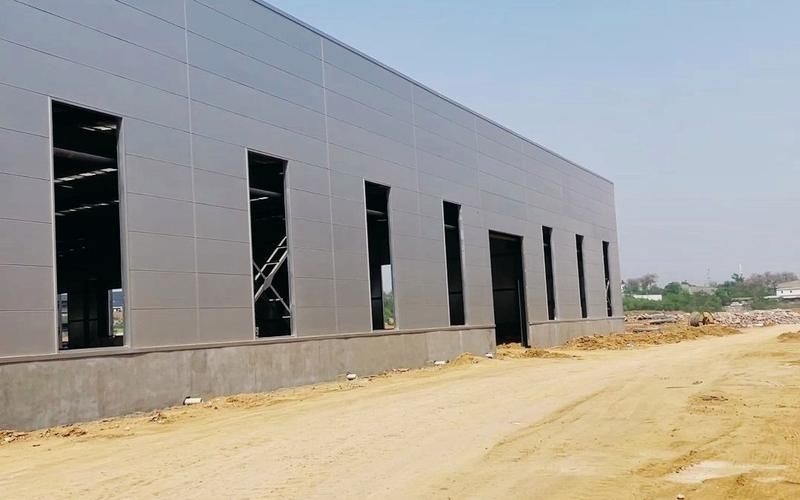 給我一些鋼結(jié)構(gòu)廠房外墻板安裝的圖片（給我一些鋼結(jié)構(gòu)廠房外墻板安裝的圖片,我?guī)湍阏伊艘恍╀摻Y(jié)構(gòu)廠房外墻板安裝的圖片） 行業(yè)新聞 第2張